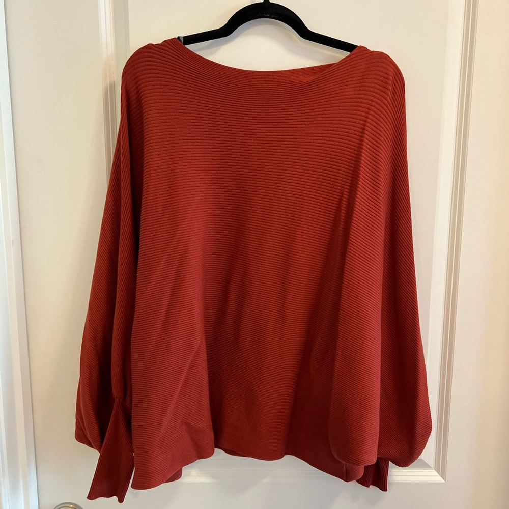 Red ribbed sweater
